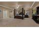 Spacious main bedroom featuring a tray ceiling, carpeting, natural light and an abundance of space at 26656 E Peakview Dr, Aurora, CO 80016