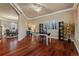 Bright office space with hardwood floors, elegant shelving, and great natural light at 26656 E Peakview Dr, Aurora, CO 80016
