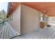 Exterior view of home featuring wood ceiling and siding, with wrap around deck at 27857 Apex Cir, Evergreen, CO 80439