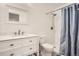 Clean bathroom with a white vanity and a shower/tub combo at 10212 W 80Th Dr # D, Arvada, CO 80005