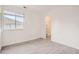 Bright bedroom with a window and access to a closet at 10212 W 80Th Dr # D, Arvada, CO 80005