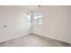 Bedroom with corner window and wood-look floors at 10212 W 80Th Dr # D, Arvada, CO 80005