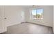 Spacious bedroom with large window and wood-look floors at 10212 W 80Th Dr # D, Arvada, CO 80005