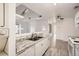 Modern kitchen with granite countertops and stainless steel appliances at 10212 W 80Th Dr # D, Arvada, CO 80005
