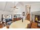 Open concept living and dining space featuring hardwood floors, and natural light at 1482 S Lansing St, Aurora, CO 80012