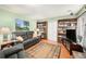 Inviting living room with comfortable seating, hardwood floors, and cozy atmosphere at 1482 S Lansing St, Aurora, CO 80012