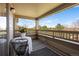 Charming outdoor balcony space featuring a table with chairs, a striped rug and views of the neighborhood at 12762 Ironstone Way # 302, Parker, CO 80134