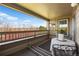 Enjoy the beautiful outdoors from this balcony with views of the surrounding trees and sky at 12762 Ironstone Way # 302, Parker, CO 80134