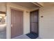 Exterior view of building entrance with two doors at 12762 Ironstone Way # 302, Parker, CO 80134