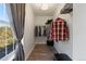 Walk-in closet featuring shelving and a window, offering ample storage and natural light at 12762 Ironstone Way # 302, Parker, CO 80134