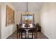 Contemporary dining room featuring a modern light fixture and a neutral color palette at 12762 Ironstone Way # 302, Parker, CO 80134
