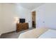 Cozy bedroom featuring a dresser and television at 5221 E 143Rd Dr, Thornton, CO 80602