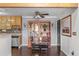This dining room connects to the kitchen and features a decorative display cabinet at 10150 E Virginia Ave # 11-202, Denver, CO 80247