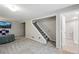 Spacious basement area with carpet, and a view of the bathroom at 9664 W Grand Ave, Littleton, CO 80123
