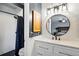 Modern bathroom with updated fixtures, walk-in shower and new vanity at 9664 W Grand Ave, Littleton, CO 80123