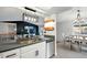 Contemporary kitchen with granite countertops, a stainless steel dishwasher, and a stylish sink at 9664 W Grand Ave, Littleton, CO 80123