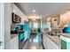 Galley-style kitchen with stainless steel appliances at 14700 E 104Th Ave # 3602, Commerce City, CO 80022