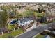 Stunning aerial view of estate with pool, manicured grounds, and mature trees in desirable neighborhood at 2 Sterling Ave, Cherry Hills Village, CO 80113