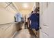 Organized walk-in closet with shelving and ample hanging space for storage at 9470 Loggia St # D, Highlands Ranch, CO 80126