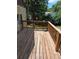 Exterior shot of the back deck with wooden rails at 2350 / 2352 Garland St, Lakewood, CO 80215