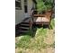 A wooden back deck with stairs leading down to the yard at 2350 / 2352 Garland St, Lakewood, CO 80215