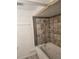 Bathroom features a jacuzzi tub, tile surround, and shower head at 2350 / 2352 Garland St, Lakewood, CO 80215