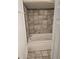 Bathroom features a jacuzzi tub, tile surround, and shower head at 2350 / 2352 Garland St, Lakewood, CO 80215