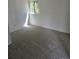 Bright bedroom features a window, fresh paint, and carpeting at 2350 / 2352 Garland St, Lakewood, CO 80215