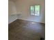 Bright bedroom with a sunlit window and cozy carpet flooring, perfect for relaxation at 2350 / 2352 Garland St, Lakewood, CO 80215