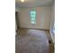 Cozy bedroom with a window allowing in natural light and a closet for storage at 2350 / 2352 Garland St, Lakewood, CO 80215