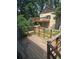 Spacious wooden deck with railing, offering access to an elevated home and scenic backyard views at 2350 / 2352 Garland St, Lakewood, CO 80215