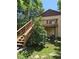 Back of home shows elevated deck with wooden support structure at 2350 / 2352 Garland St, Lakewood, CO 80215