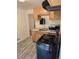 Kitchen with wood cabinets, stainless steel appliances, and modern countertops for cooking enjoyment at 2350 / 2352 Garland St, Lakewood, CO 80215