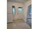 Eat-in kitchen with a window and access to the exterior at 2350 / 2352 Garland St, Lakewood, CO 80215