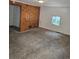 Room with wood paneling and carpeted floors at 2350 / 2352 Garland St, Lakewood, CO 80215