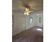 Spacious carpeted living room offering ample natural light and an open, airy feel at 2350 / 2352 Garland St, Lakewood, CO 80215
