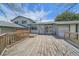 Large backyard deck with a sliding glass door leading into the house at 9255 N Delbert Rd, Parker, CO 80138