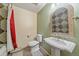 Comfortable bathroom featuring a standing sink, decorative mirror, and a bathtub with a shower at 9255 N Delbert Rd, Parker, CO 80138