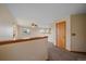Cozy living room with neutral carpet and paint, lots of windows for natural light at 9255 N Delbert Rd, Parker, CO 80138