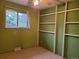 Bedroom features natural light from the window and ceiling fan at 5274 W Rowland Pl, Littleton, CO 80128