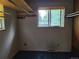 Room with an air vent, a window offering outside views, and bare walls at 5274 W Rowland Pl, Littleton, CO 80128