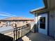 Balcony view highlighting the property's cozy outdoor space and neighborhood setting at 6725 S Winnipeg Cir # 106, Aurora, CO 80016