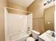 Clean bathroom features a tub and shower combo, offering functionality and comfort at 6725 S Winnipeg Cir # 106, Aurora, CO 80016