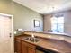 The kitchen sink and counters show an efficient area at 6725 S Winnipeg Cir # 106, Aurora, CO 80016