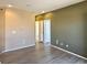 Spacious living room features modern flooring and fresh neutral paint, ready for personalization at 6725 S Winnipeg Cir # 106, Aurora, CO 80016