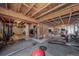 Spacious basement featuring a home gym area with fitness equipment and ample space at 5178 Netherland St, Denver, CO 80249