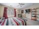 Bedroom with ceiling fan, window, and flat screen television at 5178 Netherland St, Denver, CO 80249