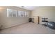 Living room with multiple windows offering natural light and views at 5178 Netherland St, Denver, CO 80249