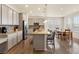Modern kitchen with granite countertops, stainless steel appliances, and ample cabinet space at 6642 E 135Th Ave, Thornton, CO 80602