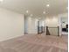Spacious upstairs living area with neutral carpet and several entryways at 6642 E 135Th Ave, Thornton, CO 80602